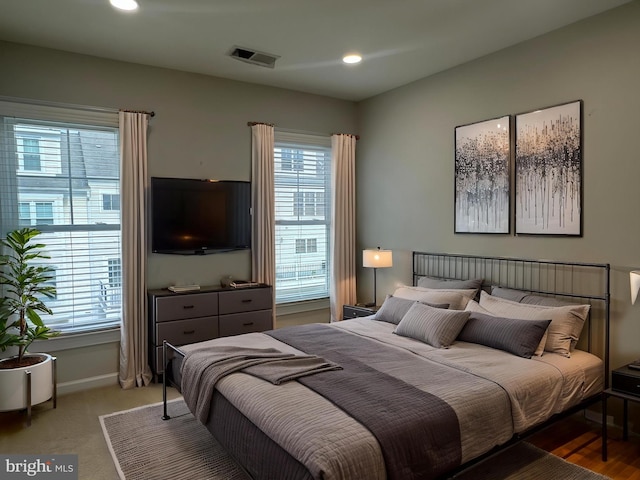 93 Heron Ln, Occoquan, VA 22125 - carpeted bedroom featuring multiple windows, recessed lighting, and baseboards