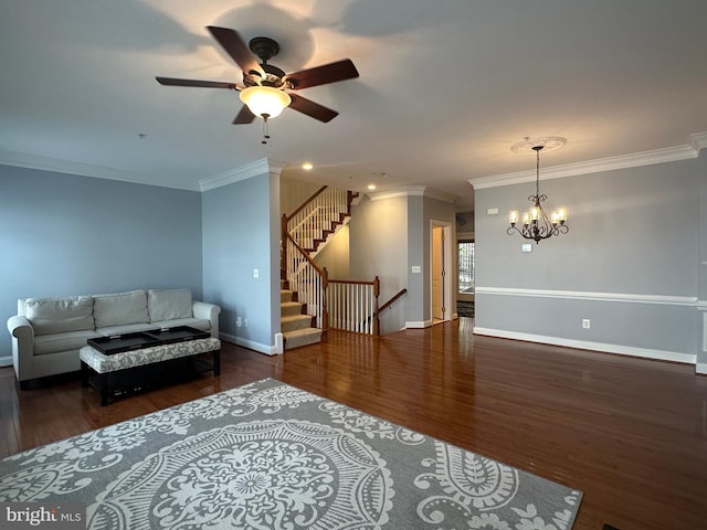 93 Heron Ln, Occoquan, VA 22125 - living area featuring wood finished floors, a chandelier, a ceiling fan, ornamental molding, and baseboards