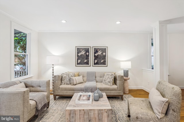 104 E Oxford Ave, Alexandria, VA 22301 - living area featuring crown molding, wood finished floors, baseboards, recessed lighting, and decorative columns