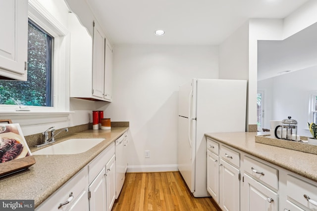 104 E Oxford Ave, Alexandria, VA 22301 - bathroom with a sink, wood finished floors, recessed lighting, and baseboards