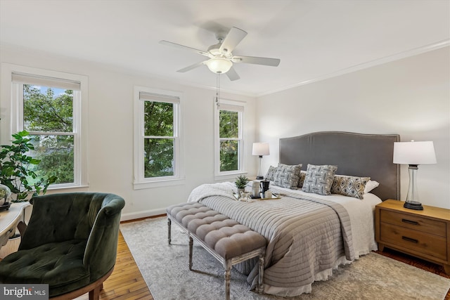 104 E Oxford Ave, Alexandria, VA 22301 - bedroom featuring multiple windows, wood finished floors, ornamental molding, baseboards, and a ceiling fan