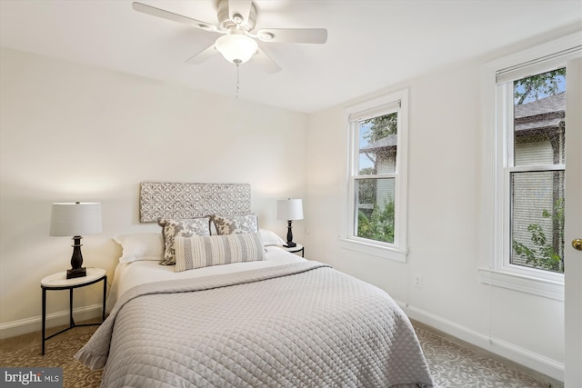 104 E Oxford Ave, Alexandria, VA 22301 - bedroom featuring baseboards, multiple windows, a ceiling fan, and carpet floors