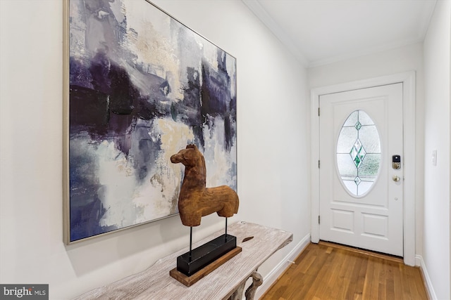 104 E Oxford Ave, Alexandria, VA 22301 - foyer with wood finished floors, crown molding, and baseboards