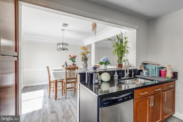 1811 Halifax Rd, Woodbridge, VA 22191 - kitchen with stainless steel dishwasher, a sink, light wood-style flooring, ornamental molding, and brown cabinets