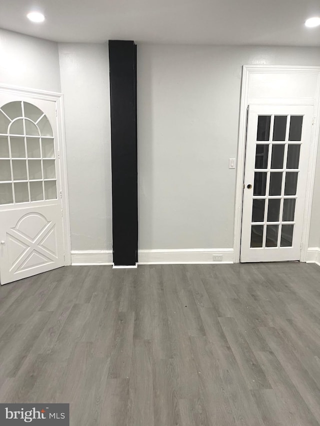 111 Oley St, Reading, PA 19601 - spare room featuring wood finished floors, baseboards, and recessed lighting