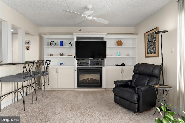 11000 Coastal Hwy Unit 1211, Ocean City, MD 21842 - living room with light carpet, a textured ceiling, and a ceiling fan