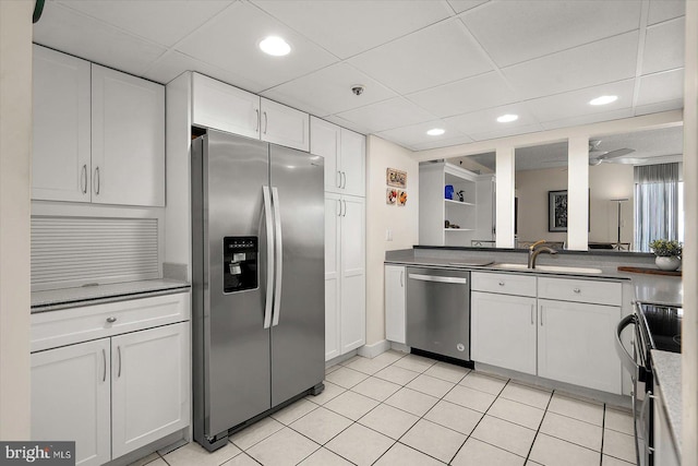 11000 Coastal Hwy Unit 1211, Ocean City, MD 21842 - kitchen featuring appliances with stainless steel finishes, a sink, white cabinets, a drop ceiling, and recessed lighting