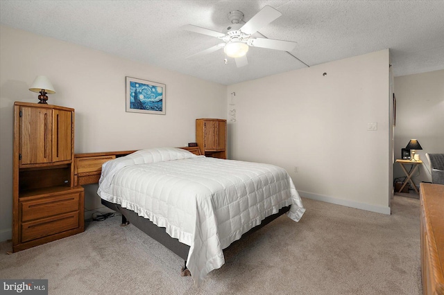 11000 Coastal Hwy Unit 1211, Ocean City, MD 21842 - bedroom featuring light colored carpet, a textured ceiling, baseboards, and a ceiling fan