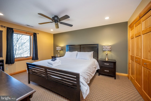 bedroom with carpet, baseboards, recessed lighting, a closet, and ceiling fan