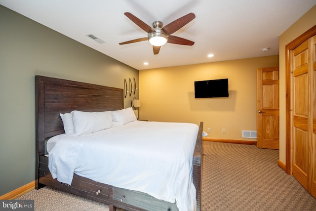 carpeted bedroom featuring baseboards, recessed lighting, and ceiling fan