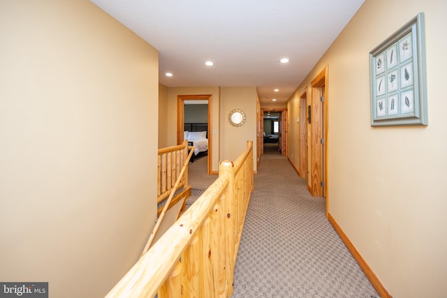 hall with light carpet and recessed lighting