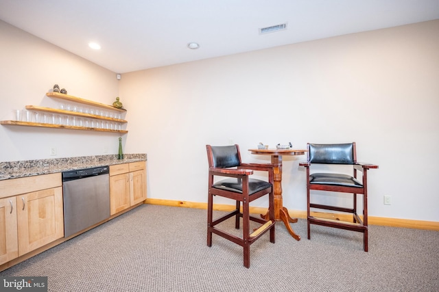 dining area featuring light carpet, bar, baseboards, recessed lighting, and a desk