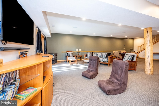 living area featuring carpet floors, recessed lighting, stairs, and baseboards