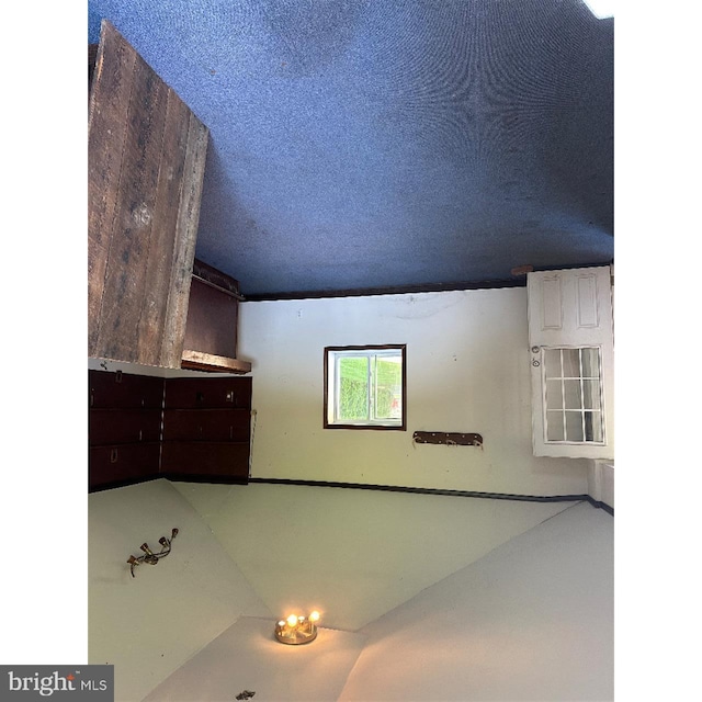 interior space with a textured ceiling