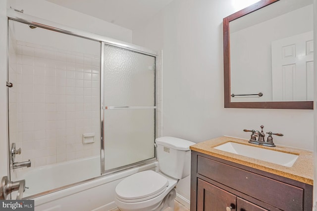 6630 Hillandale Rd Unit 56, Chevy Chase, MD 20815 - full bathroom with toilet, shower / bath combination with glass door, and vanity