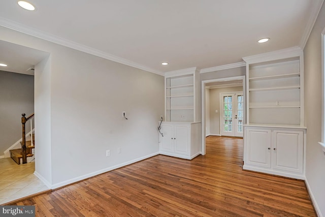 6630 Hillandale Rd Unit 56, Chevy Chase, MD 20815 - spare room featuring stairway, wood finished floors, baseboards, recessed lighting, and crown molding
