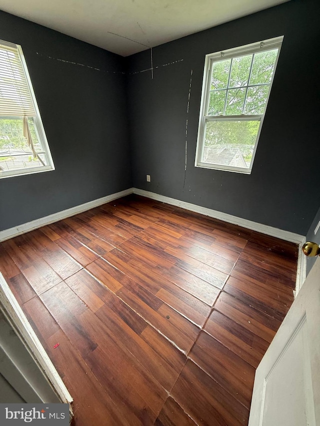 2503 Kent Town Pl Unit 2503B, Hyattsville, MD 20785 - empty room with wood-type flooring and baseboards