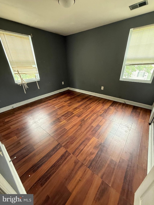 2503 Kent Town Pl Unit 2503B, Hyattsville, MD 20785 - empty room with dark wood finished floors and baseboards