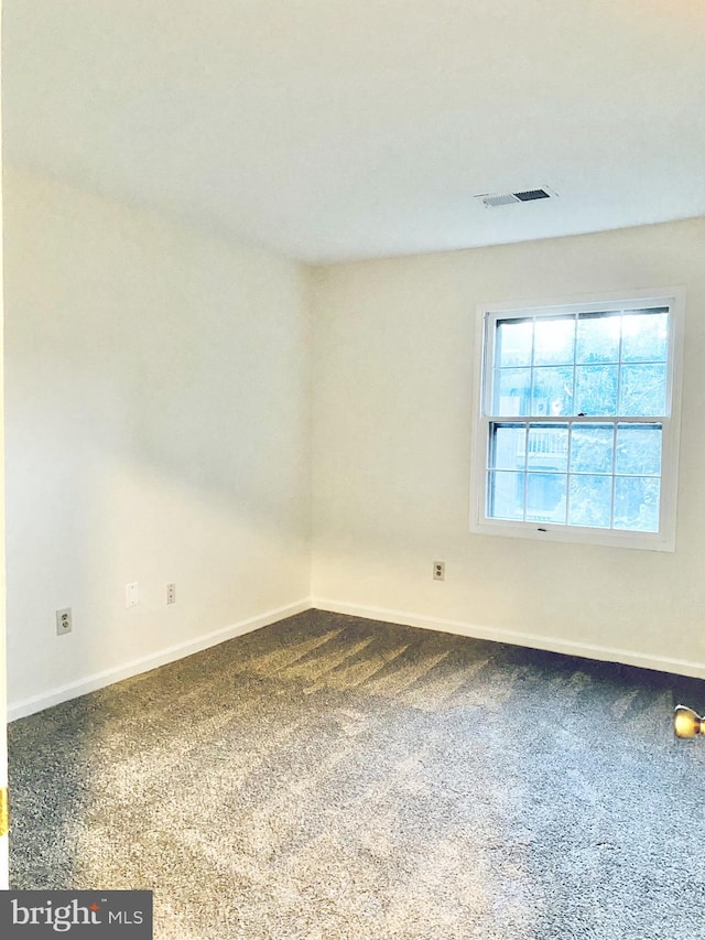 5802 Torington Dr Unit H, Springfield, VA 22152 - empty room featuring baseboards and dark colored carpet