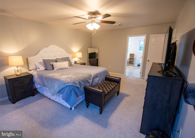 bedroom featuring carpet, baseboards, and a ceiling fan