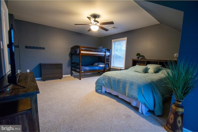 carpeted bedroom featuring a ceiling fan