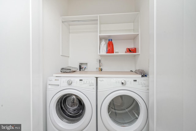laundry room featuring independent washer and dryer