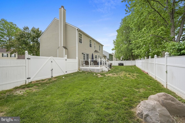 view of yard with a gate and a deck