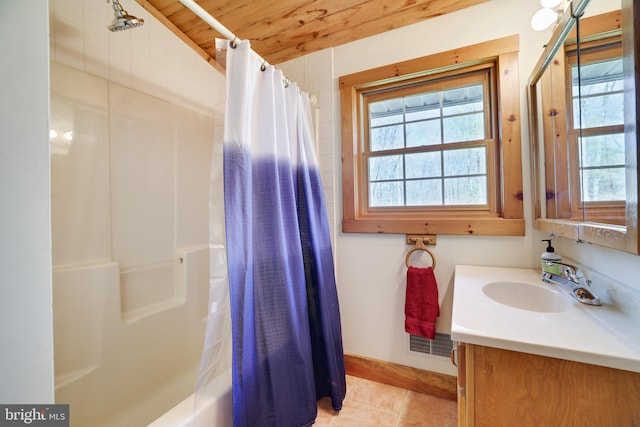 32 Black Bear Rd, Albrightsville, PA 18210 - full bath with tile patterned floors, wood ceiling, vanity, baseboards, and shower / tub combo with curtain
