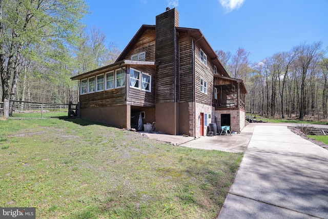 32 Black Bear Rd, Albrightsville, PA 18210 - view of side of home with a chimney, driveway, and a balcony