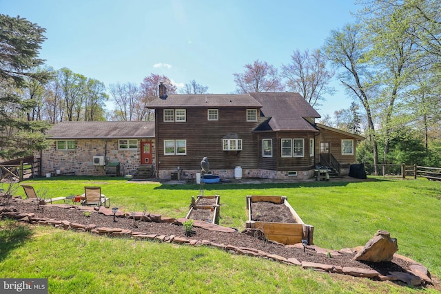 32 Black Bear Rd, Albrightsville, PA 18210 - rear view of house with entry steps, a chimney, a garden, and roof with shingles