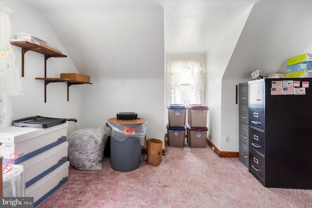 bonus room featuring light colored carpet and lofted ceiling