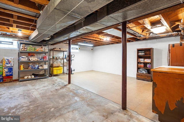 basement with tile patterned floors