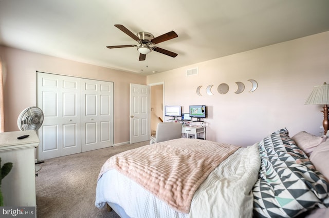 carpeted bedroom with a closet and ceiling fan