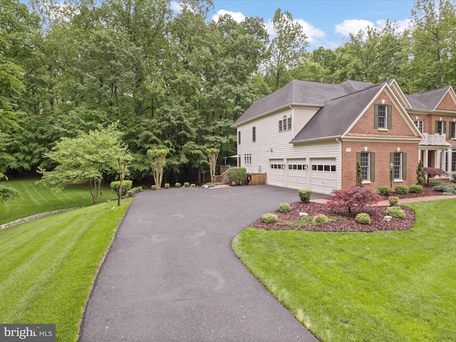 8197 Cottage Rose Ct, Fairfax Station, VA 22039 - view of front of property featuring driveway, brick siding, a front lawn, and view of scattered trees