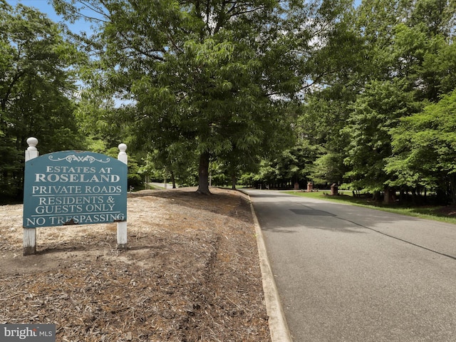 8197 Cottage Rose Ct, Fairfax Station, VA 22039 - view of street featuring view of scattered trees