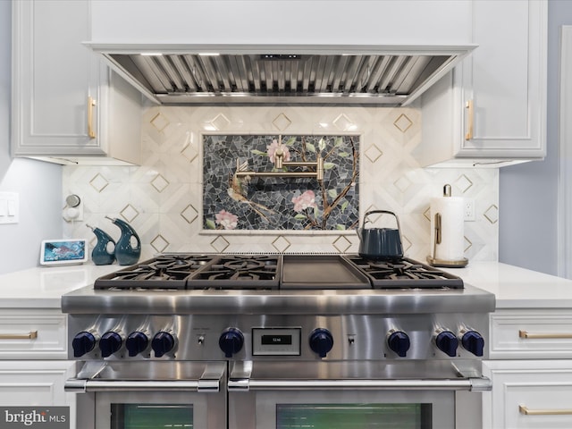 8197 Cottage Rose Ct, Fairfax Station, VA 22039 - kitchen featuring double oven range, custom range hood, light countertops, and tasteful backsplash