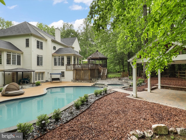8197 Cottage Rose Ct, Fairfax Station, VA 22039 - outdoor pool with a gazebo, an in-ground hot tub, a wooden deck, and stairway