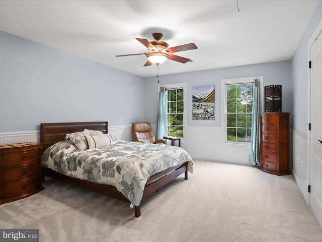 8197 Cottage Rose Ct, Fairfax Station, VA 22039 - bedroom with a wainscoted wall, carpet floors, and a ceiling fan