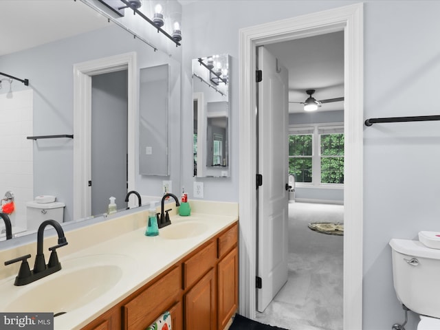 8197 Cottage Rose Ct, Fairfax Station, VA 22039 - full bathroom with ceiling fan, toilet, double vanity, and a shower