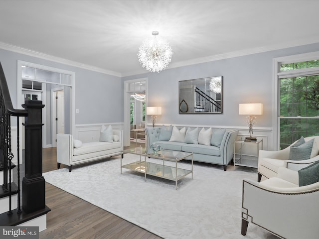 8197 Cottage Rose Ct, Fairfax Station, VA 22039 - living area featuring a chandelier, wood finished floors, ornamental molding, a wainscoted wall, and stairs