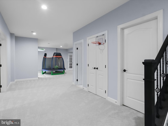 8197 Cottage Rose Ct, Fairfax Station, VA 22039 - hall with carpet floors, baseboards, recessed lighting, and stairway