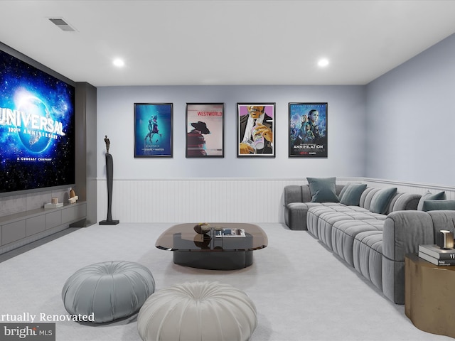 8197 Cottage Rose Ct, Fairfax Station, VA 22039 - cinema room featuring carpet floors, wainscoting, and recessed lighting