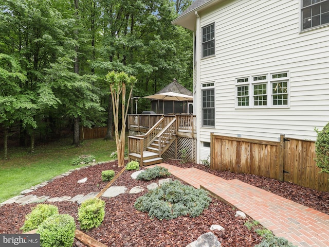 8197 Cottage Rose Ct, Fairfax Station, VA 22039 - view of yard featuring a gazebo, fence, and a wooden deck