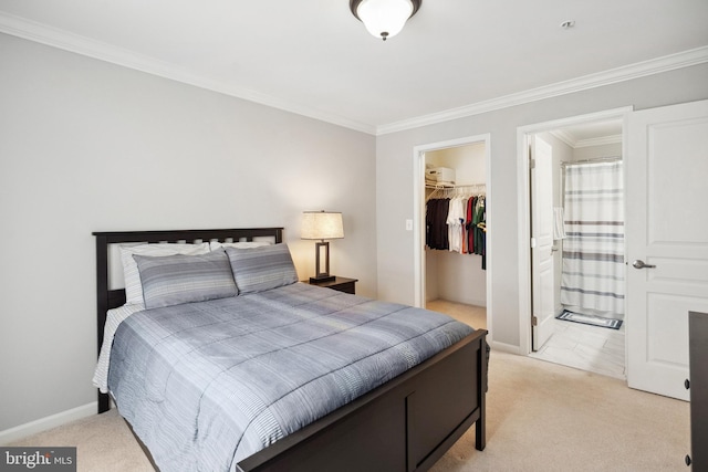 12001 Market St Unit 441, Reston, VA 20190 - bedroom with light colored carpet, crown molding, a walk in closet, a closet, and baseboards