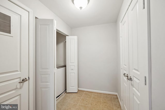 12001 Market St Unit 441, Reston, VA 20190 - laundry area featuring baseboards