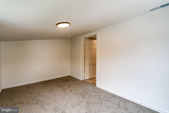 empty room with light carpet and baseboards