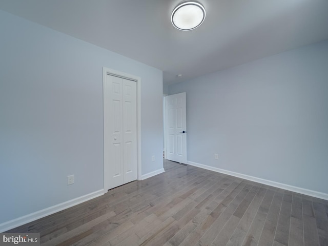 5463 Sands Rd, Lothian, MD 20711 - unfurnished room with wood finished floors and baseboards