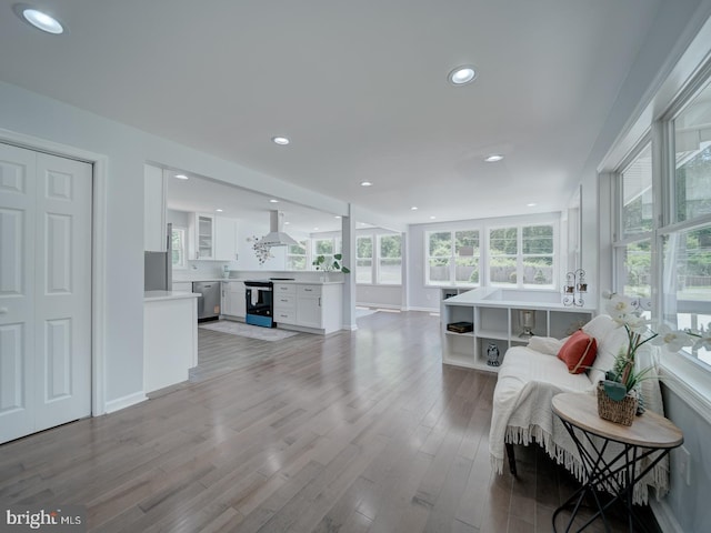 5463 Sands Rd, Lothian, MD 20711 - living room with light wood finished floors, healthy amount of natural light, recessed lighting, and baseboards