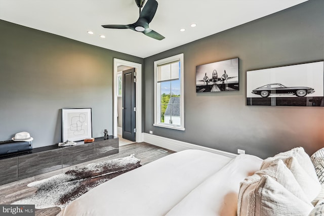 bedroom with recessed lighting, wood finished floors, baseboards, and a ceiling fan