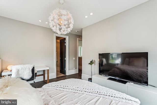 bedroom with baseboards, recessed lighting, and wood finished floors